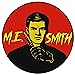 M.E.       Smith