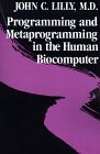 Programming & Metaprogramming in the Human Biocomputer: Theory & Experiments