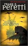 This Present Darkness by Frank E. Peretti