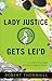 Lady Justice Gets Lei'd (La...