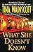 What She Doesn't Know by Tina Wainscott