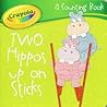 Two Hippos Up On Sticks