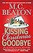 Kissing Christmas Goodbye (Agatha Raisin, #18)