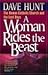 A Woman Rides the Beast by Dave  Hunt
