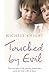 Touched By Evil: A Childhood Survived Against All Odds