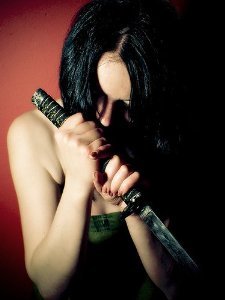 THE LONELINESS OF THE BLUE-EYED ASSASSIN (Code Name: Akiko -The Dossier on Molly Vance)