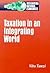 Taxation in an Integrating World by Vito Tanzi