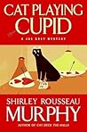 Cat Playing Cupid by Shirley Rousseau Murphy Cat Playing Cupid by Shirley Rousseau Murphy