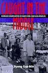 Caught in the Middle: Korean Communities in the New York and Los Angeles