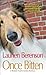 Once Bitten (A Melanie Travis Mystery) by Laurien Berenson