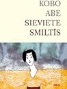 Sieviete smiltīs