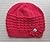 Knitting Pattern Red Hat in Waffle Stitch with a Knitted Flow... by Yelena Chen