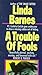 A Trouble of Fools (A Carlotta Carlyle Mystery #1)