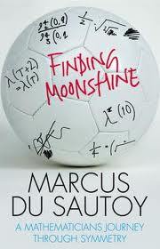 Finding Moonshine : a Mathematician's journey Through Symmetry