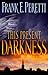 This Present Darkness by Frank E. Peretti