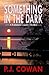 Something in the Dark by P.J. Cowan