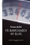 På barrikader av glas