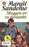 Skyggen av en mistanke by Margit Sandemo
