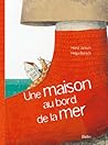 Une maison au bord de mer by Heinz Janisch