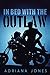 In Bed With The Outlaw (Blessed Bastards MC Romance)