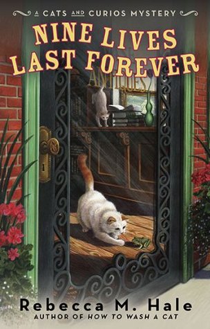 Nine Lives Last Forever (The Cats and Curios Mystery, #2)