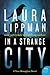 In a Strange City (Tess Monaghan #6)