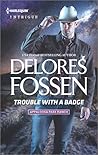 Trouble with a Badge by Delores Fossen