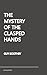 The Mystery of the Clasped Hands