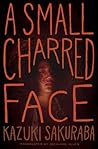 A Small Charred Face by Kazuki Sakuraba