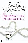 Er hangt iets in ...