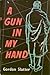 a gun in my hand by Gordon Slatter