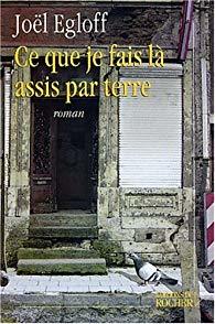 Ce que je fais là, assis par terre