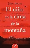 El niño en la cim...