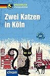 Zwei Katzen in Kö...