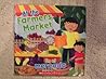 At the Farmers Market, En El Mercado, Spanish and English by Scholastic Inc.