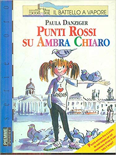 Punti rossi su Ambra Chiaro