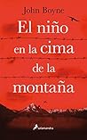 El niño en la cim...