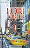 Bajo su piel by Lori Foster
