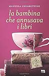 La bambina che annusava i libri by Manuela Chiarottino