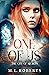 One of Us by M.L.    Roberts