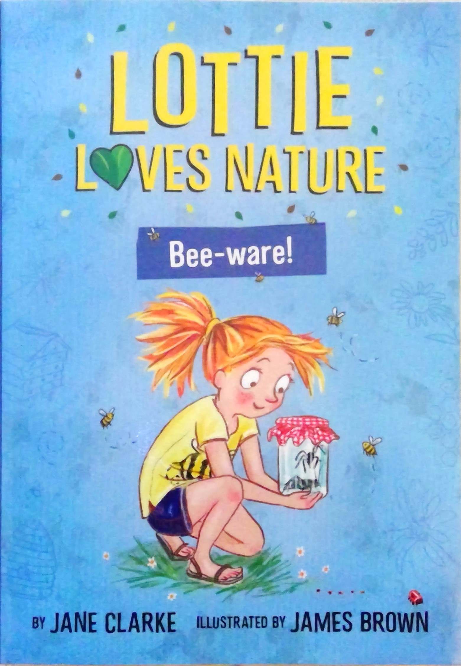 Lottie loves nature. Bee-ware!