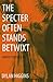 The Specter Often Stands Be...