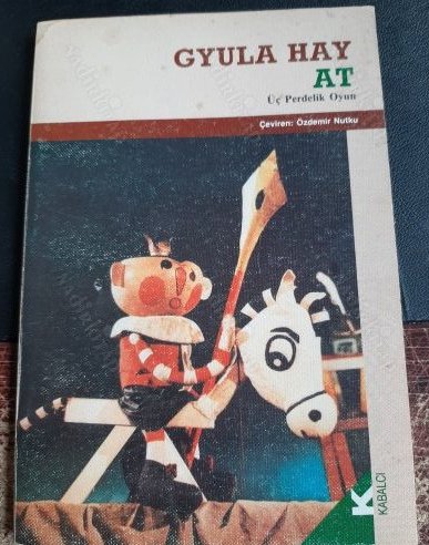 At (Paperback)