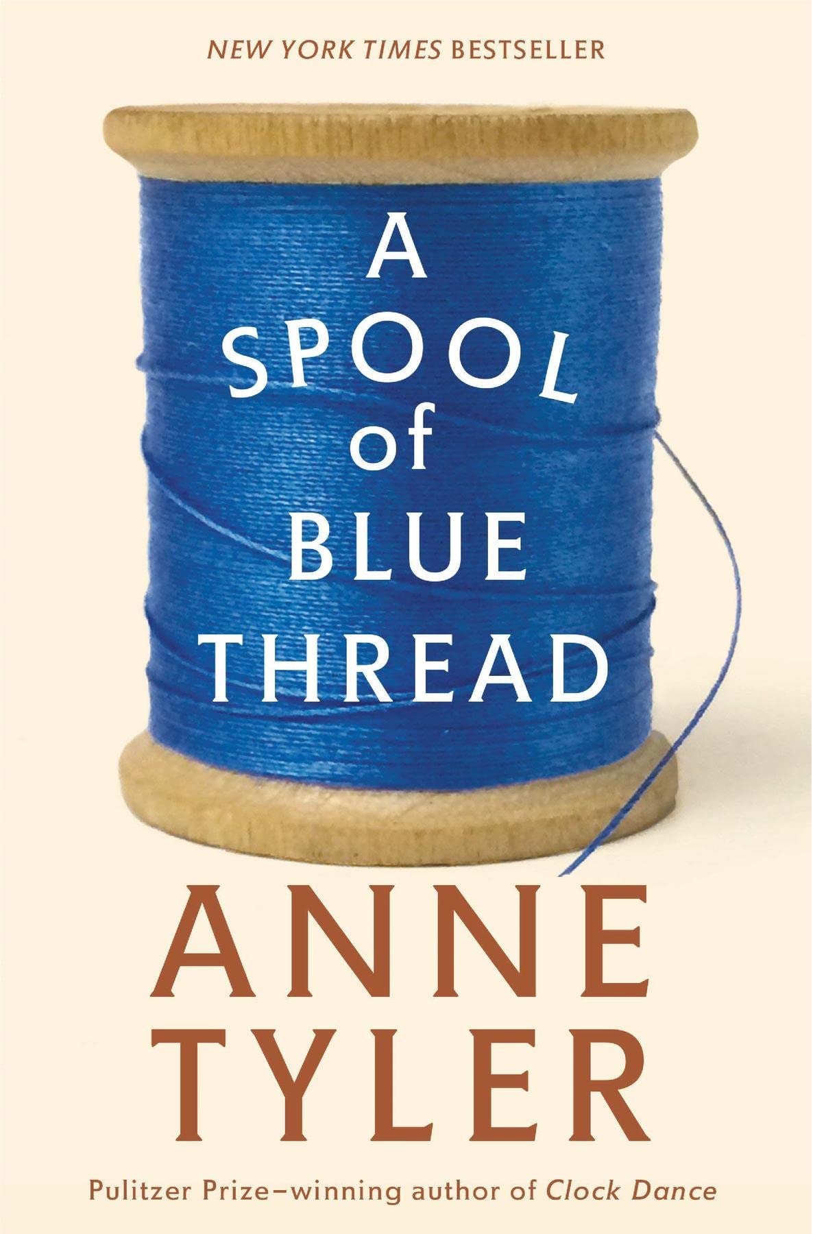 A SPOOL OF BLUE THREAD