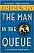 The Man in the Queue