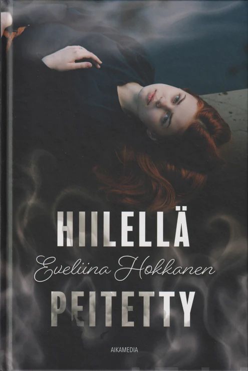Hiilellä peitetty (Hardcover)