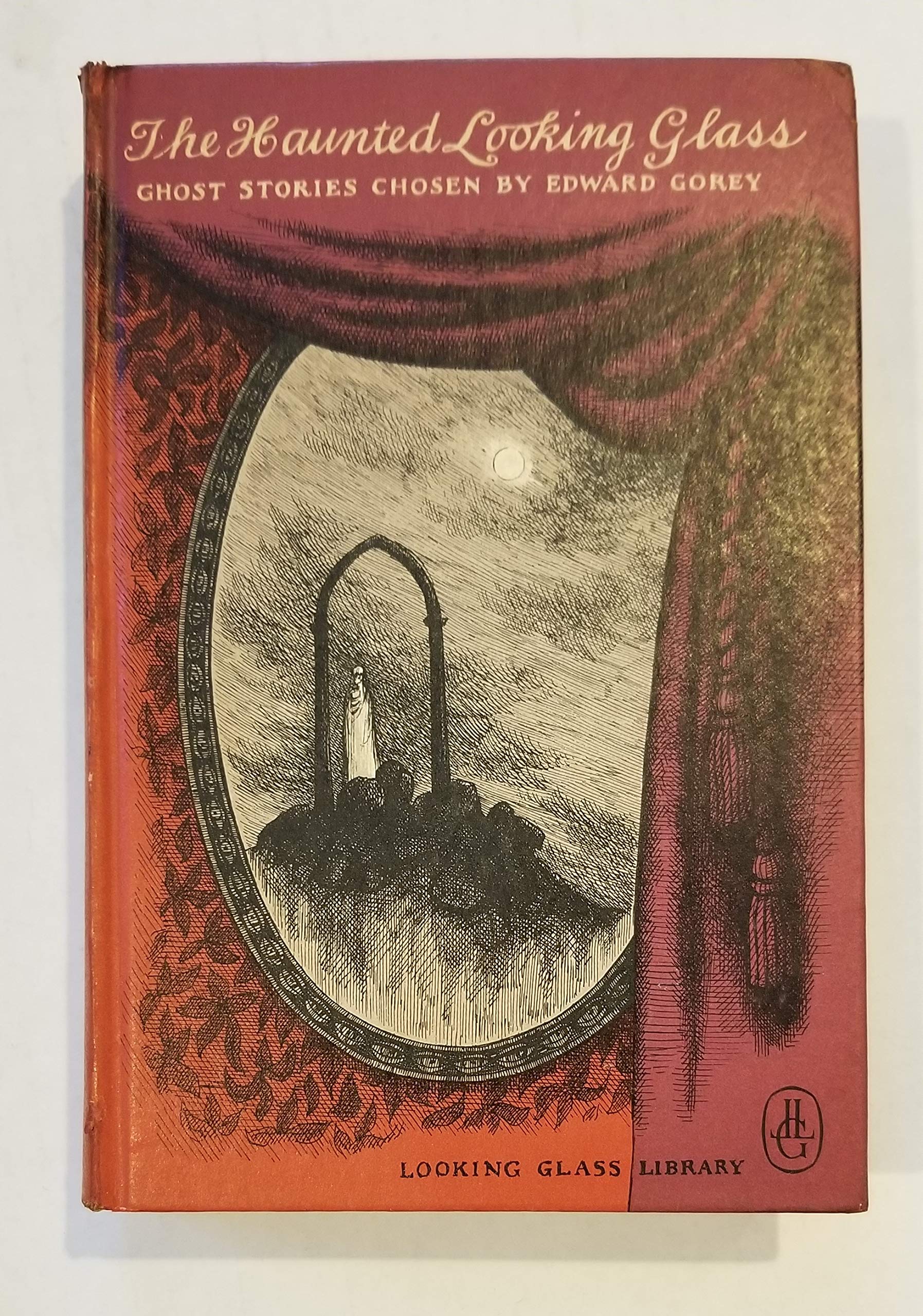 The Haunted Looking Glass - Ghost stories chosen & Illustrated By Edward Gorey ( Empty House - August Heat - Signalman - Visitor from Down Under - Thirteenth - Body-Snatcher - Man Size in Marble - Judge's House - Shadow of a Shade - Monkey's Paw -and More (Hardcover)