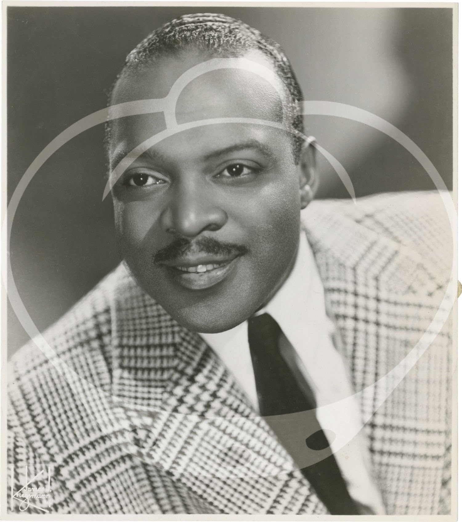 Collection of thirteen original photographs of Count Basie (Hardcover)