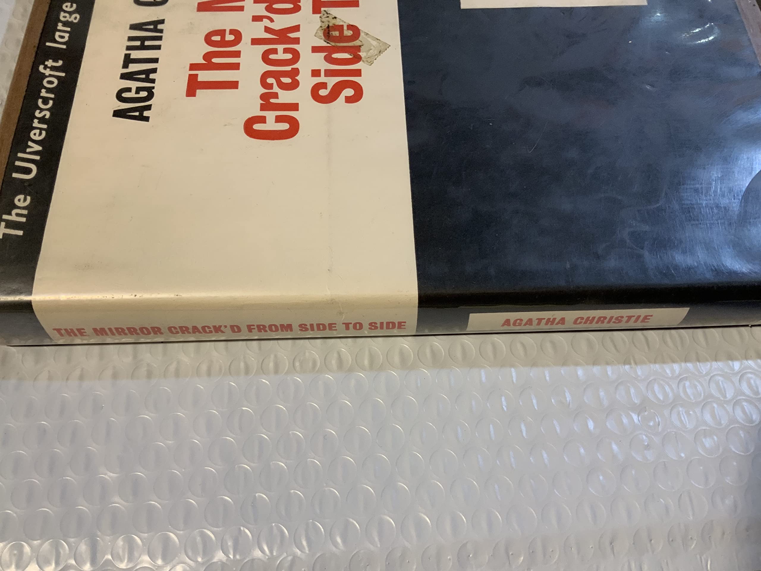 The Mirror Crack'd from Side to Side