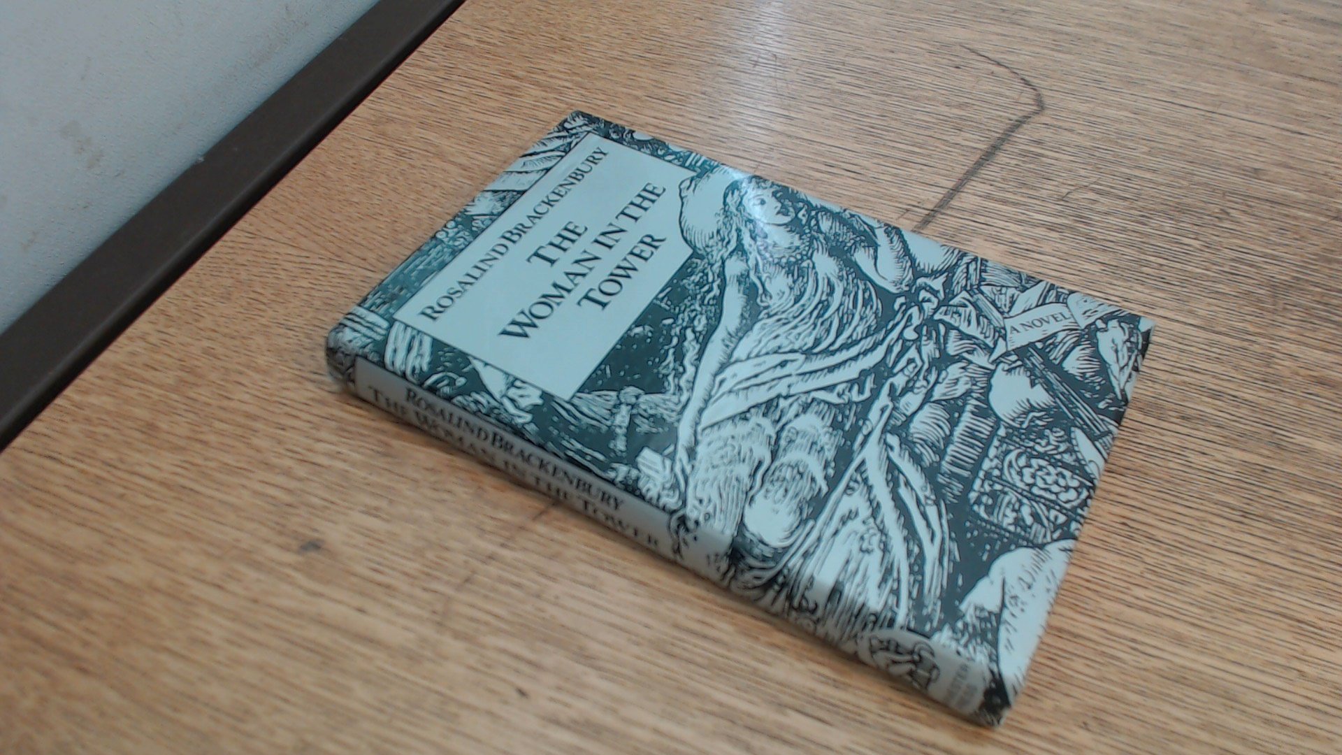 The woman in the tower (A Harvester novel)